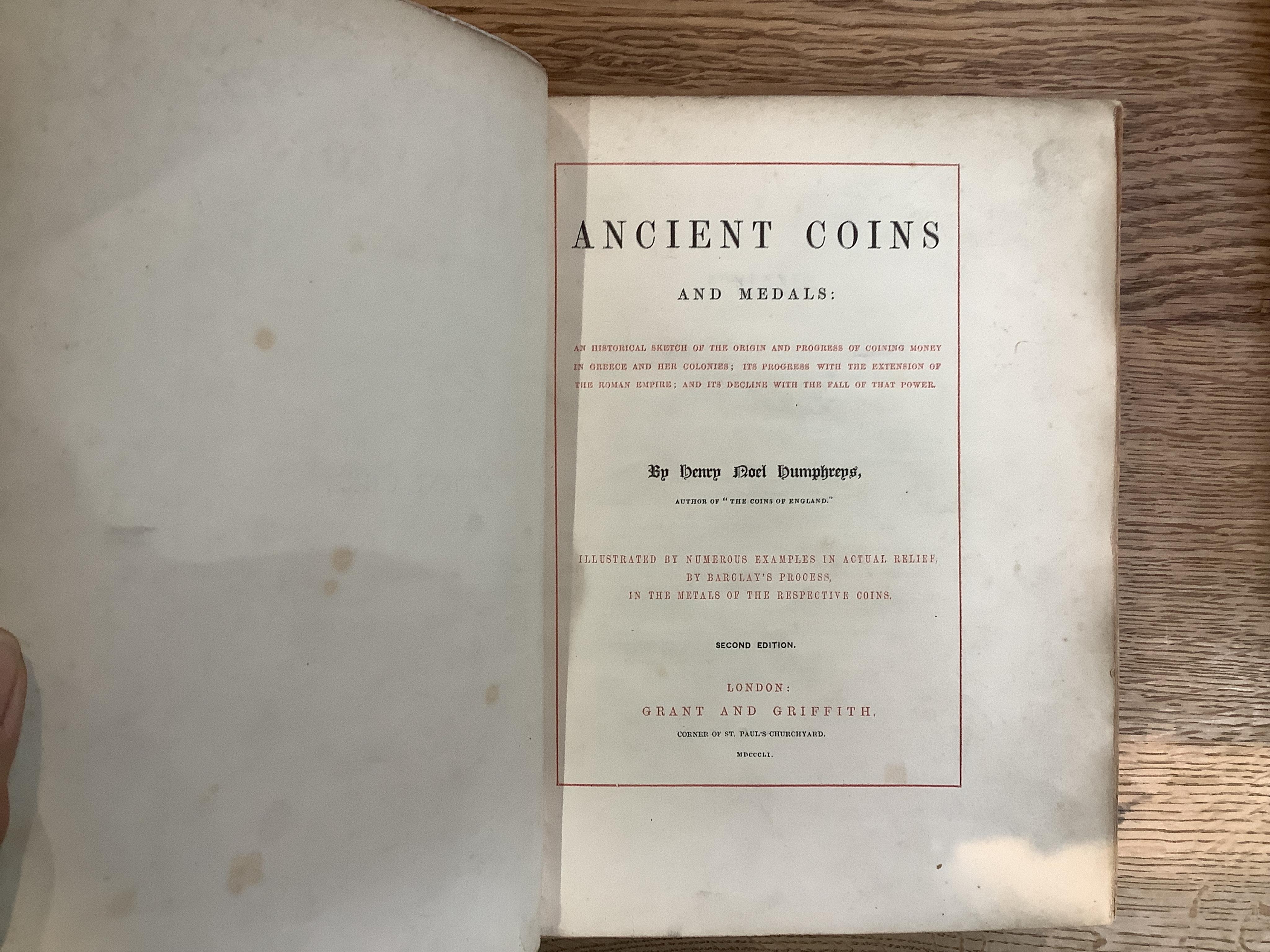 Humphreys, Henry Noel. Ancient Coins and Medals. London: Grant and Griffith, 1850. Octavo, original elaborately embossed full brown calf, marbled endpapers with 114 relief facsimiles of coins and medals on ten thick moun